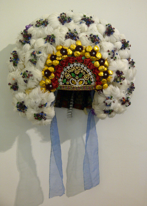 unique bridal headdress made from feathers artificial flowers beads and ribbons used in Ivano-Frankivsk region of Ukraine
