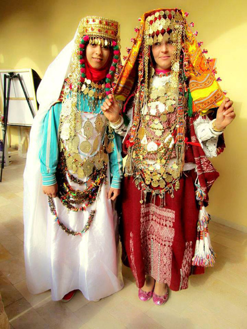 Tunisian women in traditional costumes with plenty of jewelry