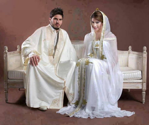 Tunisian couple in wedding clothing man is wearing white harir jebba