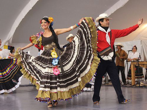 Man and woman in Colombian traditional costumes