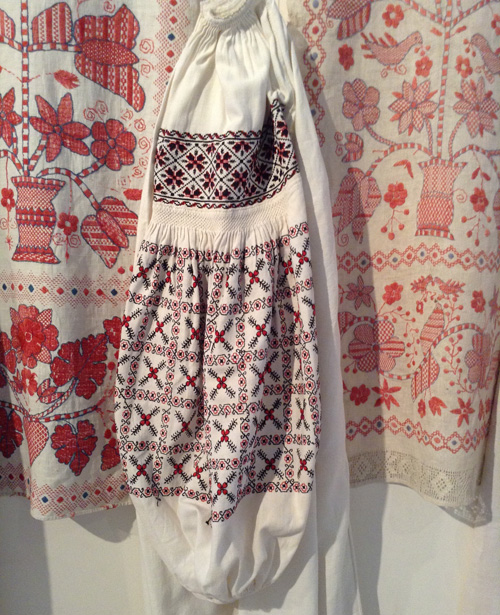 Traditional embroidery on women’s shirt and ceremonial towels from central regions of Ukraine