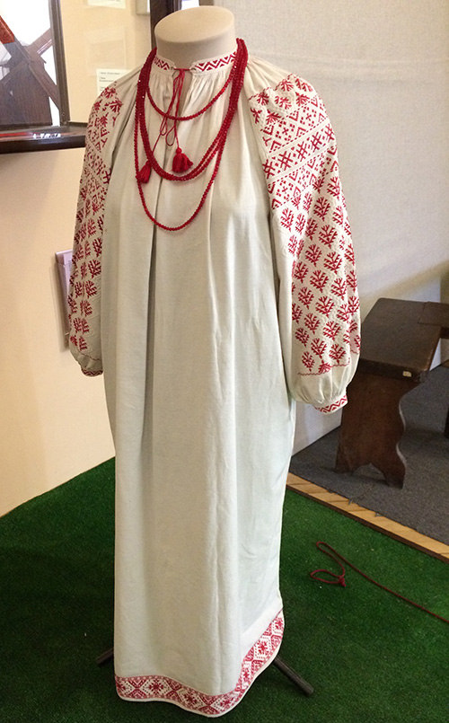 Female embroidered shirt and glass necklace from Ukraine early 20th century