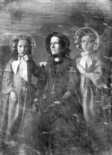 Woman with two daughters 1840s