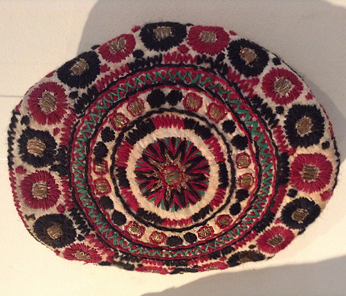 Ukrainian traditional embroidery with woolen and gold threads on women’s coif