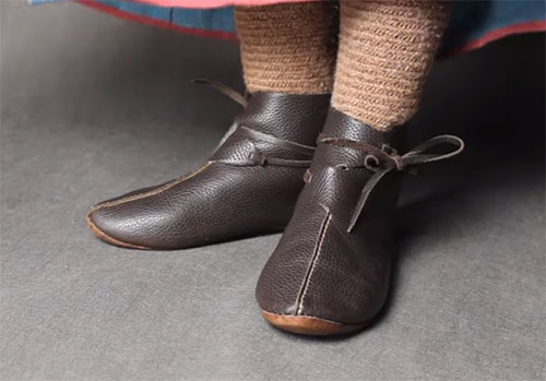 Modern replicas of socks and leather shoes typical for Kyivan Rus of 10th century
