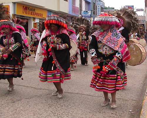 Peruvian dancers in folk costumes at the parade