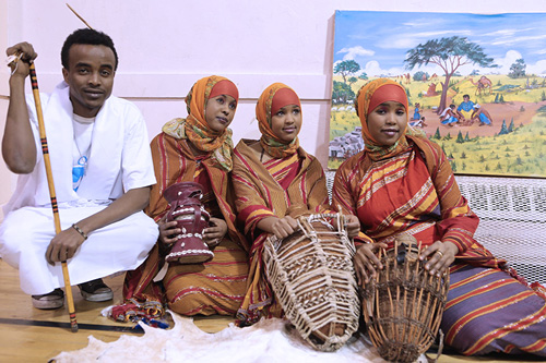 Somalian youth with museum artifacts