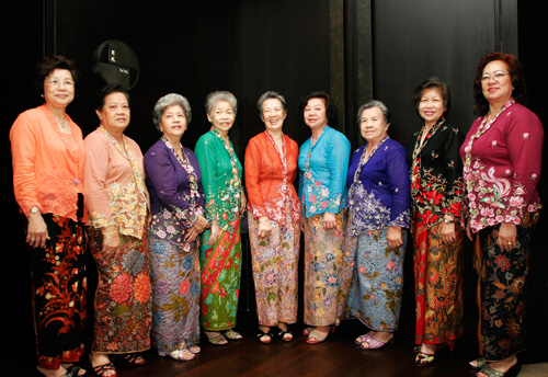 Women in traditional Peranakan nonya kebaya