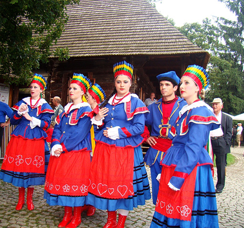 Folk dancers in modern costumes from Kujawy region of Poland