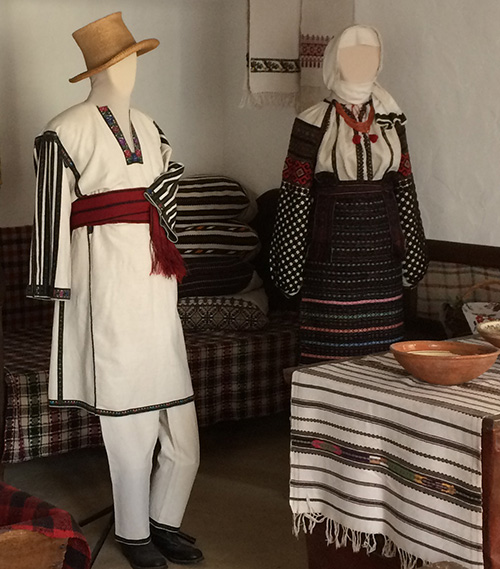 Vintage male and female folk outfits from Podillia region of Ukraine early 20th century