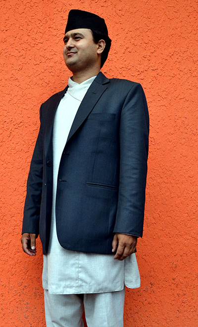 Man wearing daura suruwal with classic suit