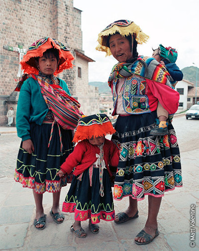 Women with children in Peruvian traditional costumes
