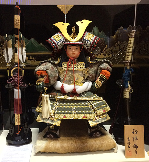 Japanese doll wearing samurai clothing