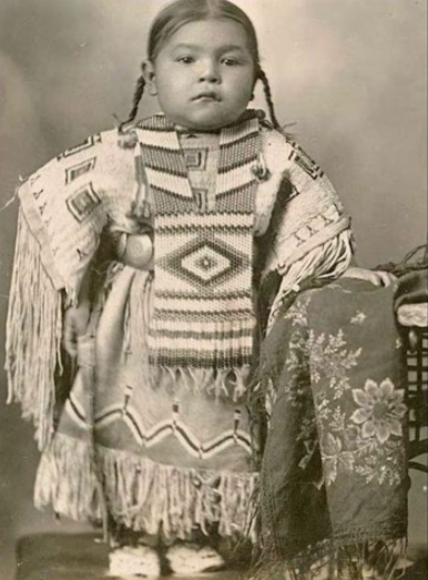 Cheyenne girl in beaded dress and breastplate Early 1900s Oklahoma