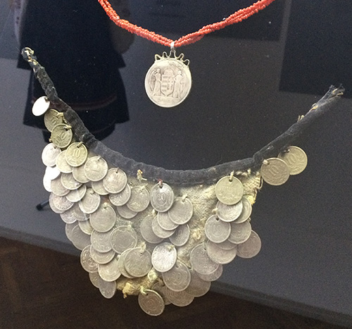 Traditional Ukrainian jewelry salba made from a piece of cloth with dozens of silver coins