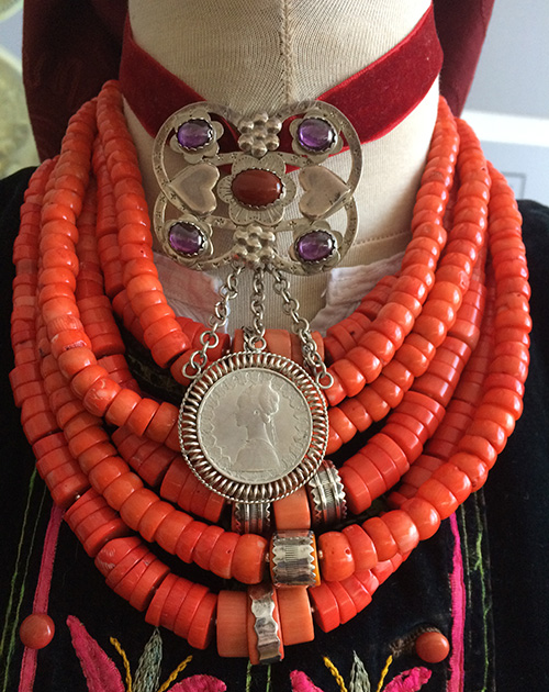 Gorgeous jewelry set coral necklace with silver decorations and silver dukach adorned with gems