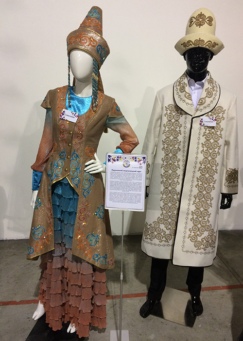 Modern replicas of Kyrgyz male and female national garments