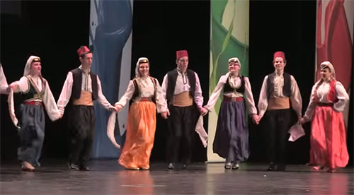 Bosnian folk dancers in traditional outfits