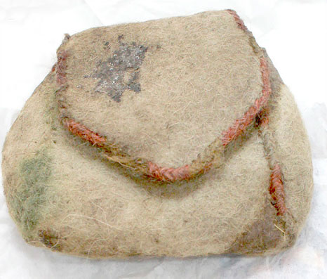 Ancient felt clutch from millennium-old tomb looks just like some Louis Vuitton pouch or Dolce & Gabbana purse