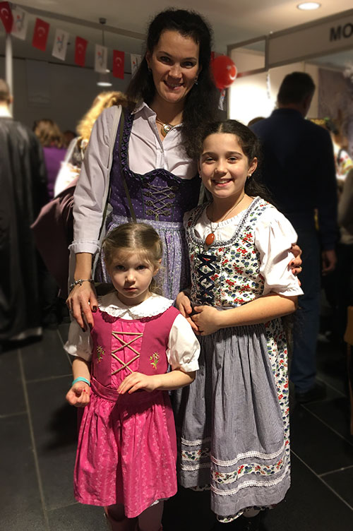 Woman and girls in German dirndl dresses