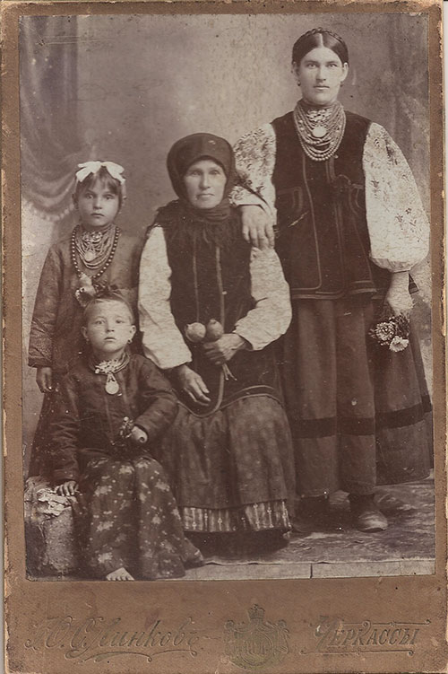 Ukrainian family in folk clothes and jewelry from Cherkasy region central Ukraine early 20th century