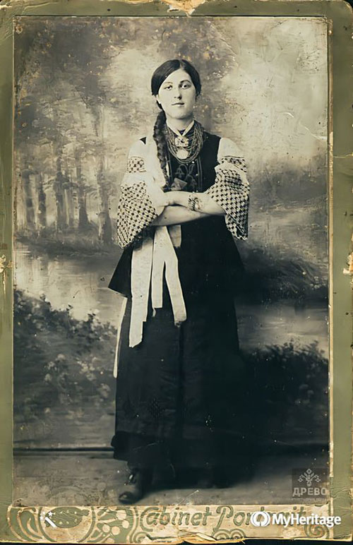 Unmarried maiden in traditional festive attire from Poltava region central Ukraine early 20th century