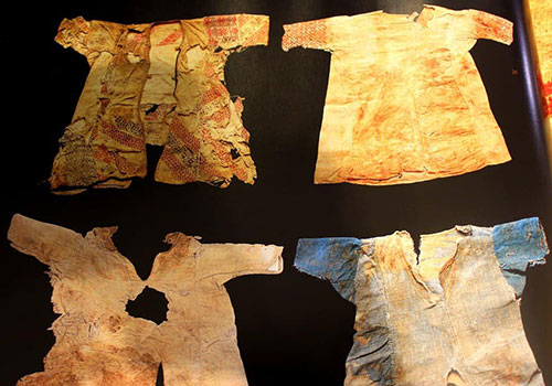 Lebanese 13th-century mummies in cross-stitch embroidered tunics