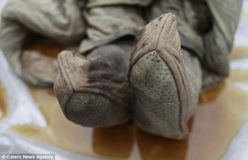 Taizhou mummy dated Ming Dynasty shows us accurate 700-year-old Chinese clothing