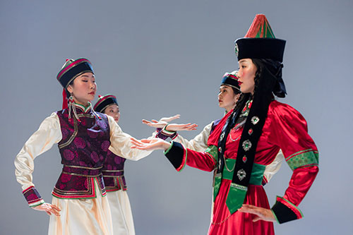 Kazakh dancers in elegant outfits