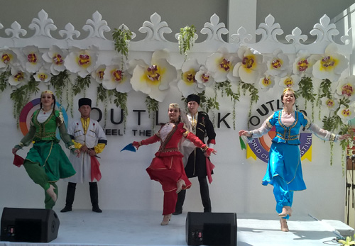 Azerbaijani folk dancers in elegant and colorful folk garments