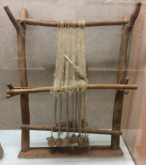 ancient vertical weaving loom used by people of the Cucuteni-Trypillia culture (appr. 4800-3000 B.C.)