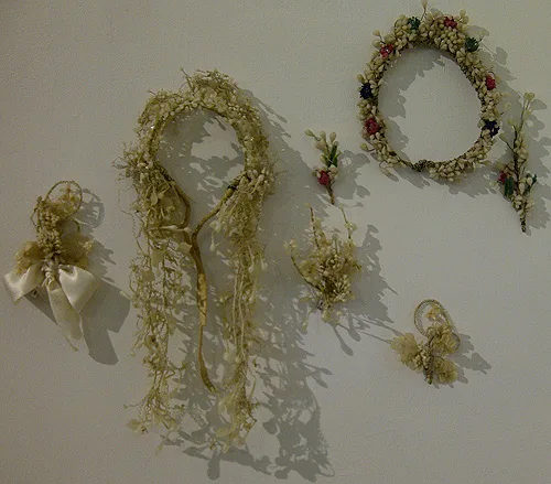 Bridal wreaths and hairpins made from wax, ribbons and flowers
