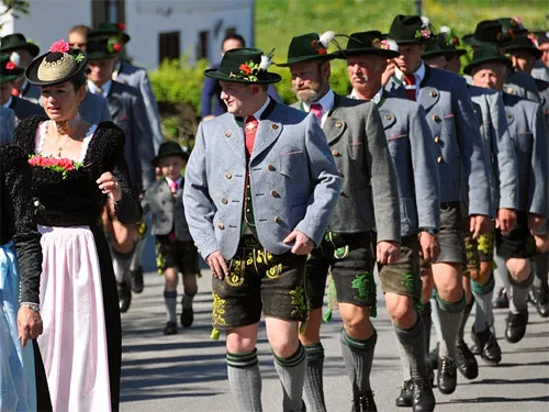 Traditional Bavarian (Germany) folk dress: dirndl dress and lederhosen