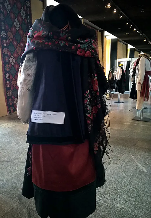 Female traditional costume of married woman with large beautiful kerchief from Chernihiv region northern Ukraine