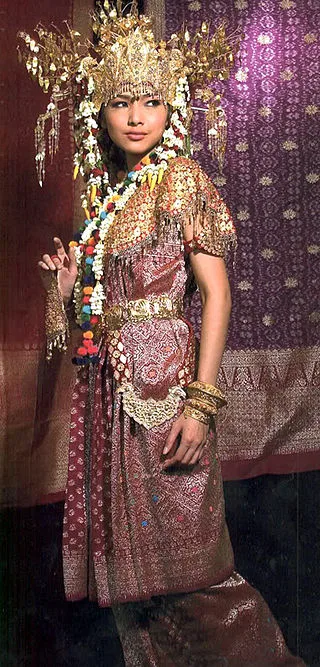 Woman wearing wedding dress of South Sumatra Indonesia