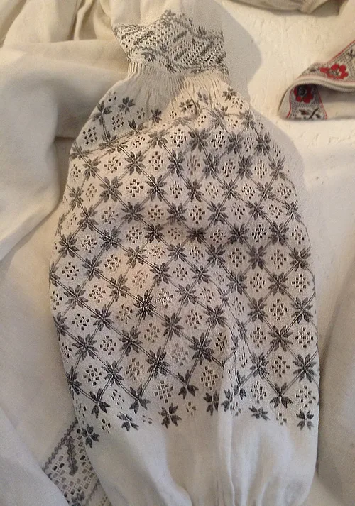 Ukrainian needlework pattern on the sleeve of female shirt