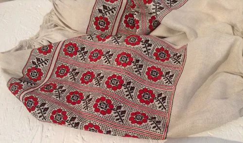 Young girl’s embroidered shirt with floral pattern