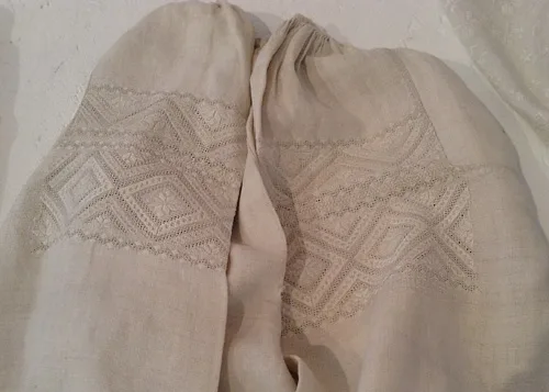 Ukrainian whitework on the sleeve of female shirt