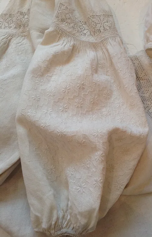Embroidery design on the sleeve of female shirt