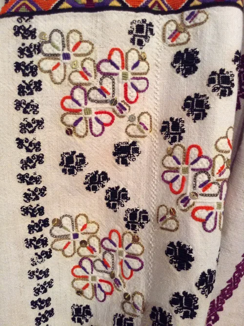 Embroidery design with sequins on women’s shirt from Bukovyna region western part of Ukraine