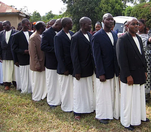 National outfit of Tanzania. Male kanzu and female kanga are the main folk garments