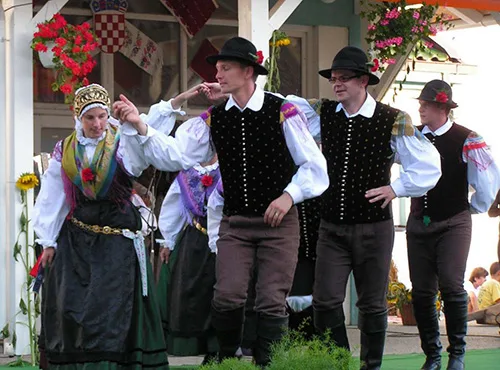 Slovenian national costume. Cool undergarments, male breeches, and intricate women’s headdresses