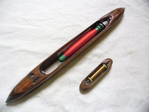 Two different weaving shuttles