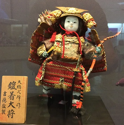 Japanese doll wearing traditional clothing