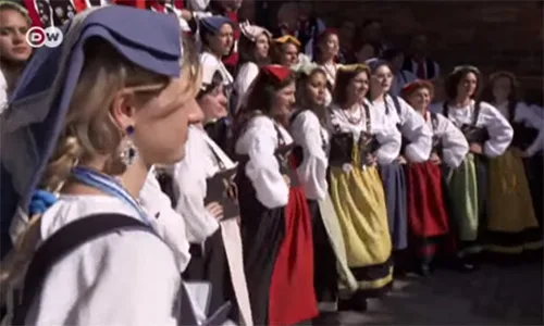 Variety of European folk costumes. Over 250 European regions on one folk festival