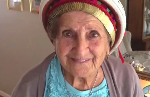 Palestinian national costume described by the local elderly woman