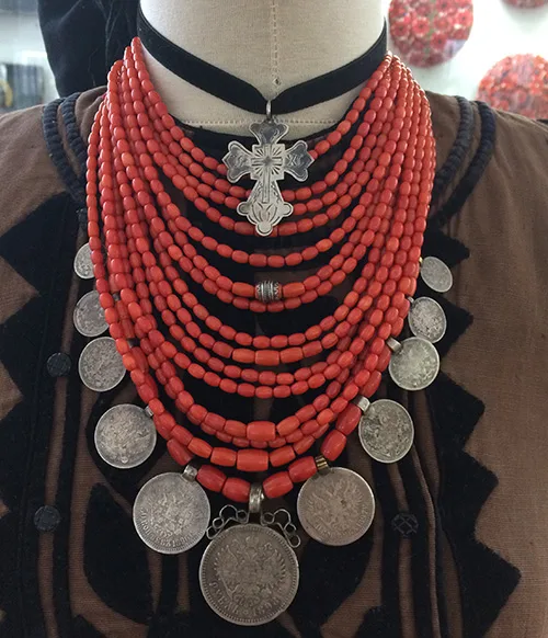 Pretty coral necklace combined with dukach pendants and a silver cross