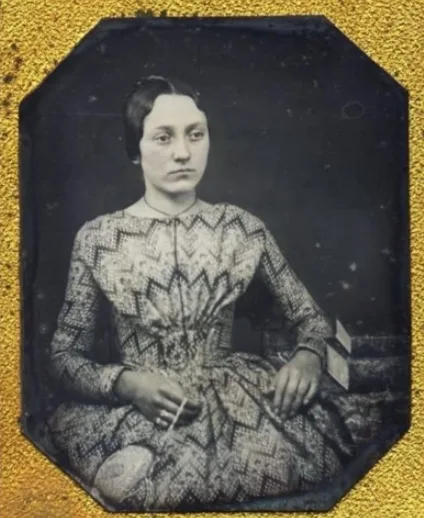 Young woman in bead print dress 1845