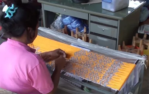 Ikat silk weaving in Thailand. Traditional Thai craft