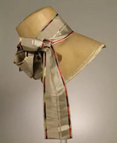 straw bonnet with silk ribbons